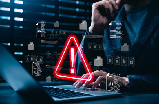 Data security warning and cyber risk alert concept. Person using laptop with digital files, lock icon, red warning symbol. data breach, document protection, threat detection, secure incident response