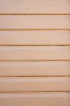 Pale peach painted horizontal wooden boards texture