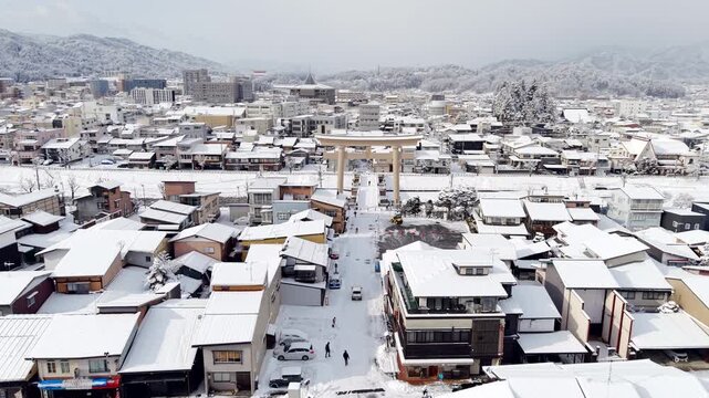 Aerial view of Takayama blanketed in snow during winter in the Hida region, Gifu, Japan.