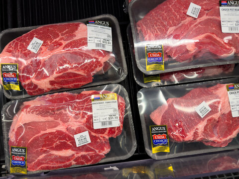 Frisco, Texas, USA - September 14th, 2026: Angus USDA Choice chuck roast beef packages sitting on refrigerator shelf