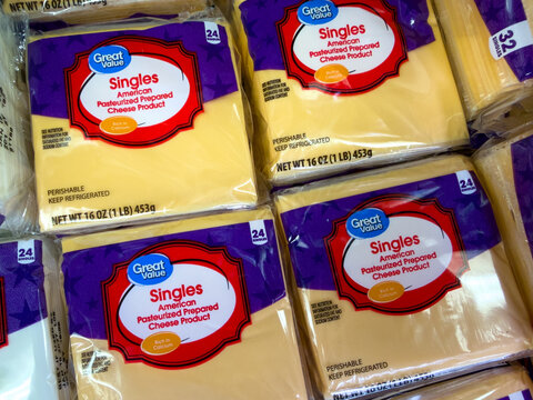 Frisco, Texas, USA - September 14th, 2026: Packaged Great Value American singles pasteurized prepared cheese product sitting on store display shelf