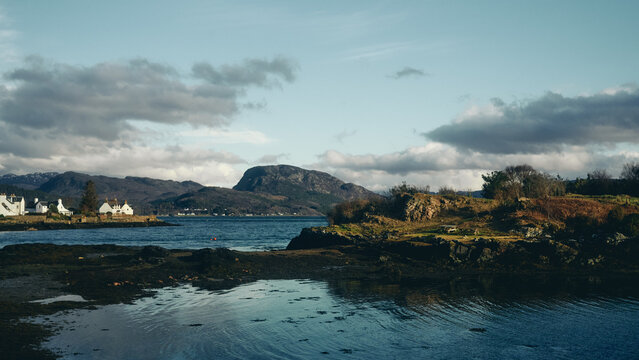 houses and mountains by the water in Plockton