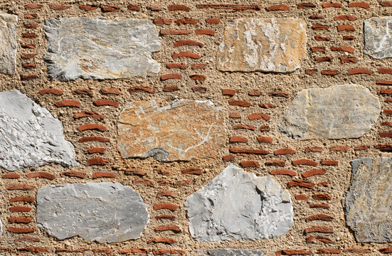 Traditional alternating stone-and-brick masonry on the Boz&uuml;y&uuml;k Culture House in Muğla, showcasing a distinctive Ege and Mediterranean vernacular building technique