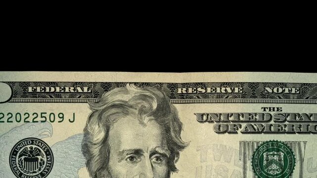Close up shots of American hundred and twenty dollar bills.