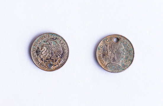 Vintage Mexican 5 Centavos Coin from 1959 Showing Both Sides with Patina and Holes