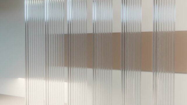 rotating architectural fluted glass louvers casting caustic shadows on stone wall, luxury interior design backdrop.