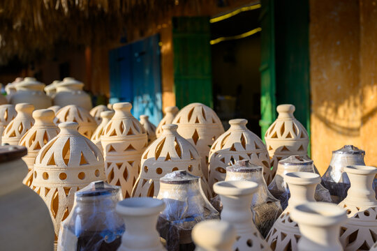Doha, Qatar &ndash; November 29, 2023: A daytime shot from the Katara Traditional Dhow Festival showing a popular market displaying a variety of traditional pottery, decorative geometrically perforated clay
