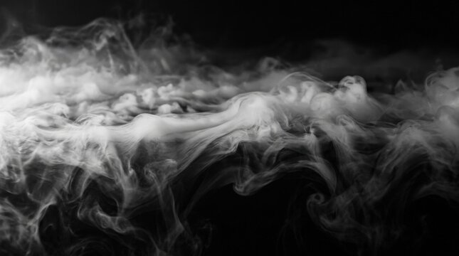 Thick white mist rolling over a dark background