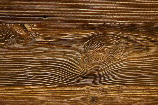 close up of a strongly grained wood - Nahaufnahme eines stark gemaserten Holzbrettes