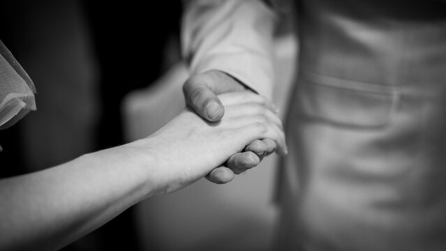 Closeup photo of holding hands