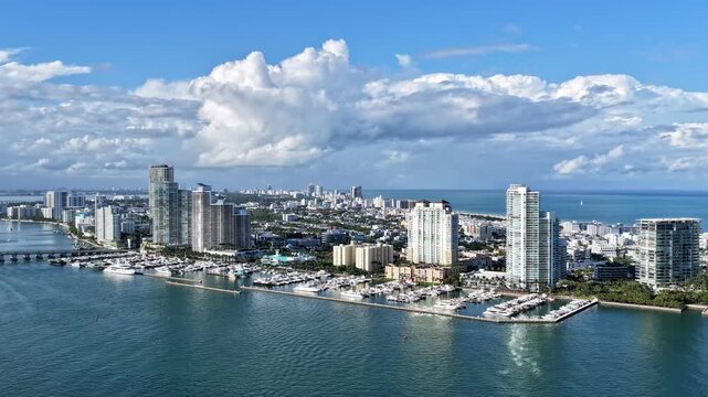 Luxury yacht. Miami south beach aerial view. Marina in Miami, Florida hyperlapse. Yacht harbor motion. Hyperlapse Miami marina with luxury yacht. Summer vacation. Luxury South beach marina