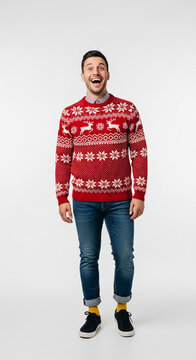 Man in red Christmas sweater with deer and snowflake pattern, blue jeans, yellow socks, and sneakers, standing against a white background, representing holiday cheer.