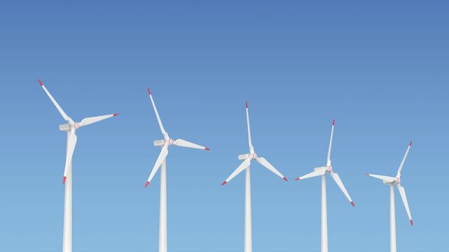 Row of five spinning wind turbines generating electricity against blue sky