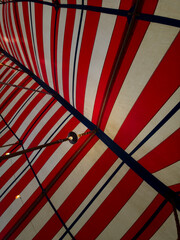 Colorful Carnival Tent Ceiling with Diagonal Lines and Geometric Pattern © Tom