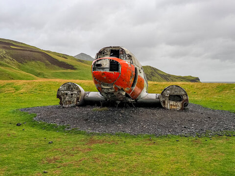 Airplane wreck of a Douglas DC-3, also known as the Dakota, the most iconic aircraft in aviation history, close-up. The airplane became a tourist attraction. Eyvindarholt, Hvolsv&ouml;llur, Iceland.