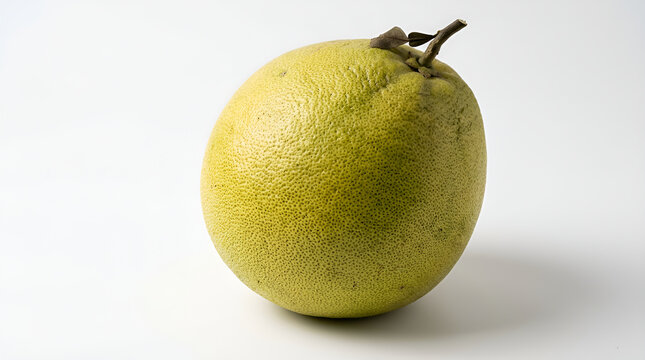 One whole greenish yellow pomelo citrus large round coarse porous with short woody stem small green leaf, fresh glossy on clean white surface soft shadow minimalist