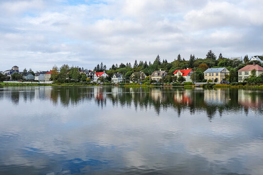Panoramic view of the old town of Reykjav&iacute;k - City of Sagas. Colorful buildings and Lake Tj&ouml;rnin. Beautiful capital and largest city of Iceland. Fr&iacute;kirkjuvegur district, Reykjanes Peninsula.