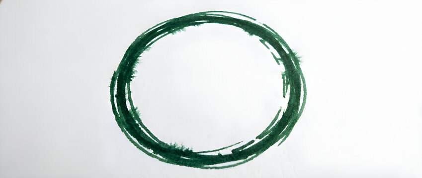 Green hand-drawn circle on white background