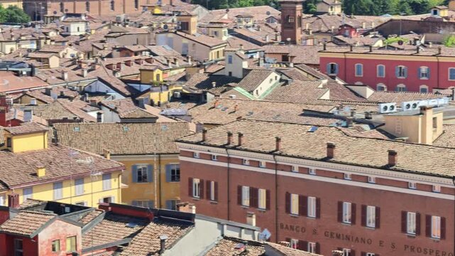 close up aerial shot capturing the vibrant heart of Modena city, as seen from Ghirlandina bell tower of Modena city in Italy