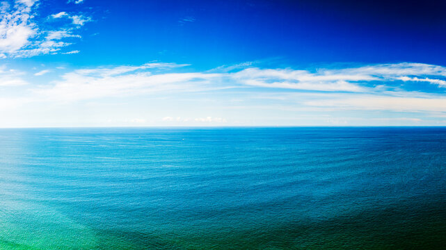 panoramic drone view of ocean and sky