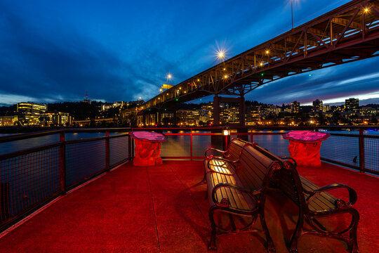 Observation point in the Willamette River riverwalk in twilight in Portland, Oregon