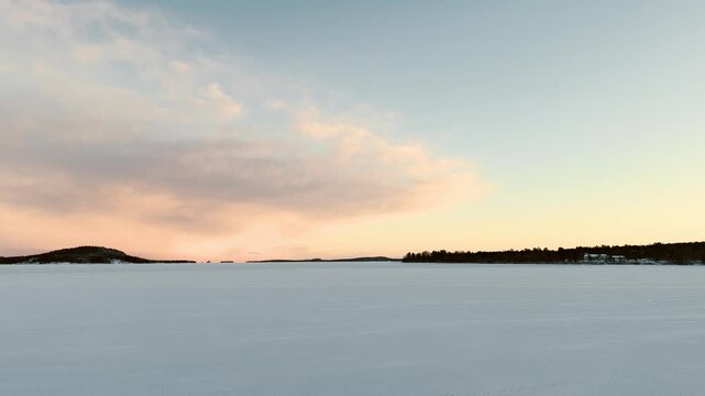 Arctic Winter Sunset Over Frozen Juutuanvuono Fjord Inari Lapland
