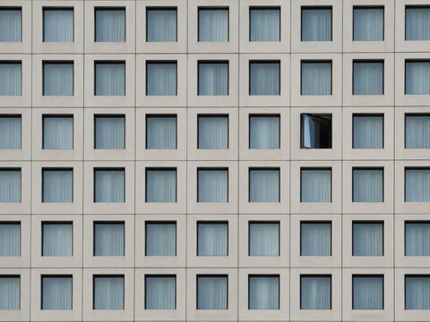 Single Open Window in Repeating Facade