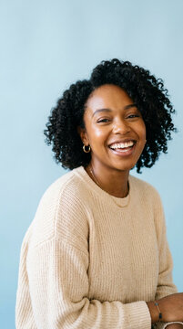 Young Black Woman Smiling Happily