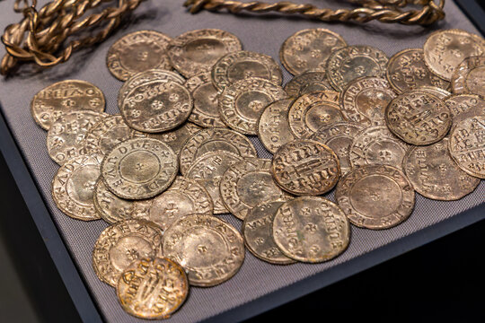Collection of 10th-century Viking silver coins and twisted arm ring hoard