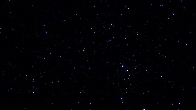 黒い宇宙空間に高密度の青白い星が散在し奥から手前へ進み続ける奥行きのある星空ループ背景