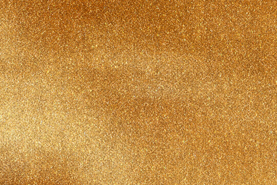 Luxurious golden glitter texture background for elegant festive holiday marketing and design