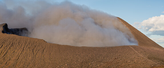 Close-up of dense volcanic smoke and gas rising from the crater of Telica volcano © Leopoldo