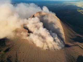 Aerial view of Telica volcano crater emitting thick smoke and gas © Leopoldo