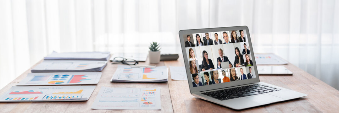 Business people on video conference for brisk virtual group meeting of corprate business office workers