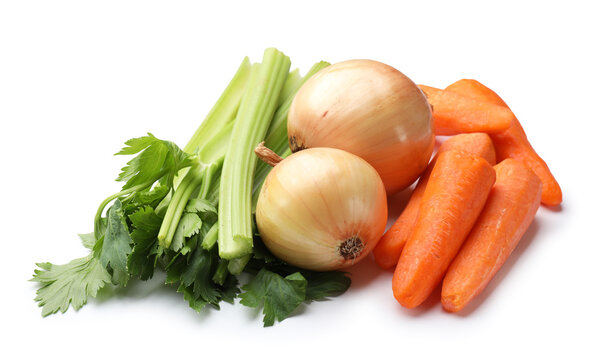Fresh celery stalks, carrots and onion bulbs isolated on white