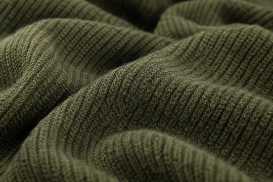 Olive ribbed knit fabric close up