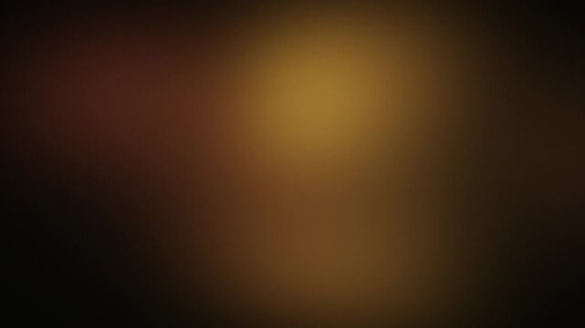 Soft glowing bronze amber lights drifting on dark background, seamless abstract gradient loop for wedding and event videos
