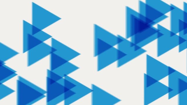 Abstract blue triangles moving across white background in dynamic geometric motion loop for video design