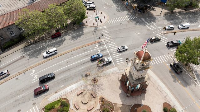 Aerial view of afternoon traffic passing the historic clock tower of downtown Santa Cruz, California, USA.