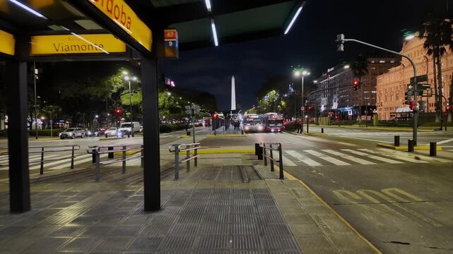 Metrobus Station on 9 de Julio Avenue with Obelisk at Night