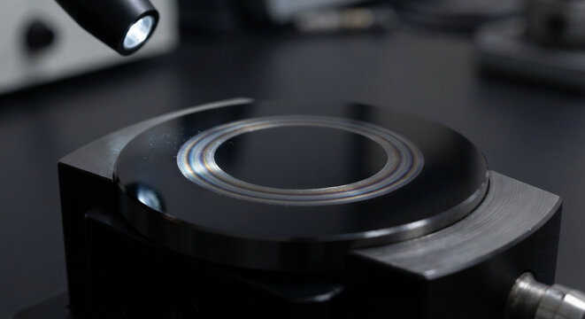 Advanced tribology diamond-like carbon dlc coating friction wear track on polished steel surface with iridescent colors