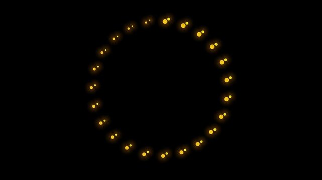 Golden glowing particle loading circle spinner animation on black background