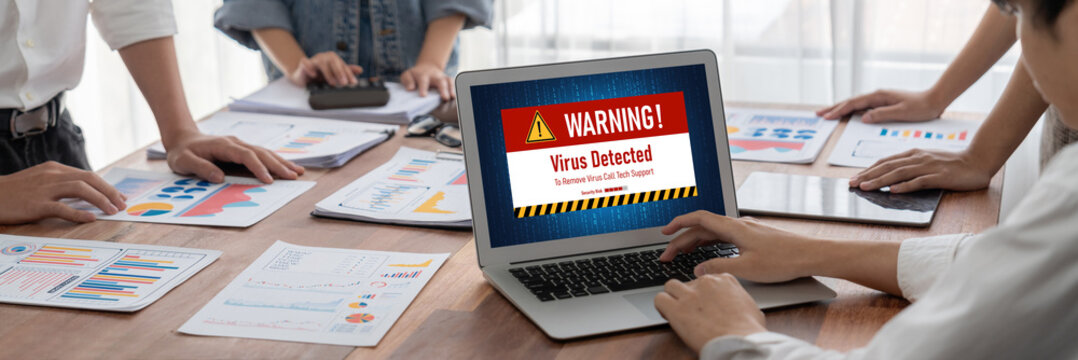 Virus warning alert on computer screen detected brisk cyber threat , hacker, computer virus and malware