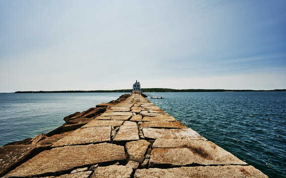 the Rockland Breakwater Lighthouse located at the end of a nearly mile-long granite breakwater in Rockland, Maine, New England