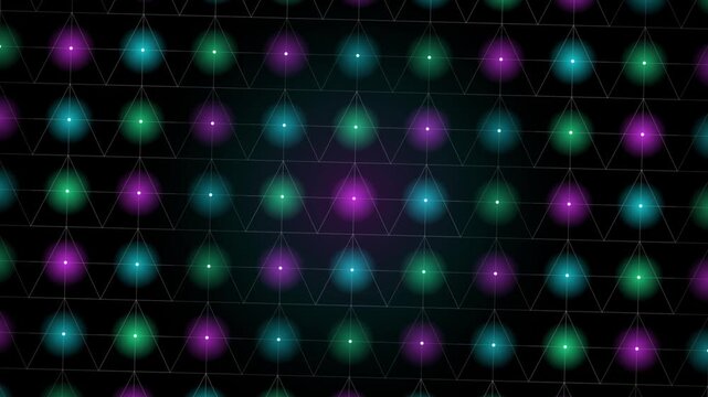Glowing cyan and purple led dot matrix lights flashing on dark background