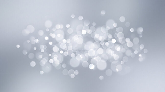 Nuage de lumi&egrave;res bokeh argent&eacute;es floues sur fond gris doux
