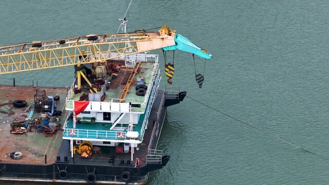 Industrial Crane Barge Vessel Floating in Coastal Waters