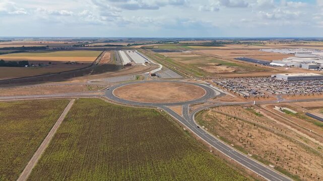 Debrecen, Hungary BMW Group vehicle manufacturing plant with electric car production facilities, solar panels and logistics infrastructure in an industrial park, aerial view.