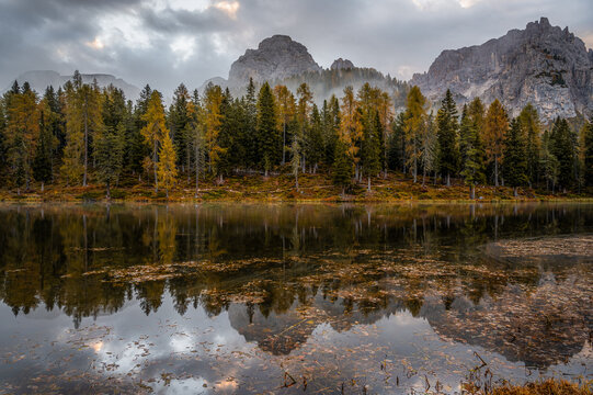 Lake Antorno (Lago di Antorno) Dolomites. Tre Cime di Lavaredo. Scenic autumn morning scenery with colorful sky . Travel banner, Italy