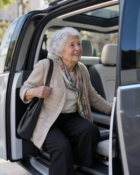 Smiling senior woman entering a modern passenger vehicle, suggesting accessible on-demand mobility, independence and confidence in later life.